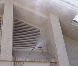 Pressure cleaning palm beach vents on house.